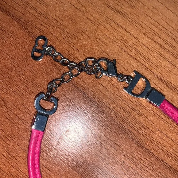 Authentic Christian Dior Leather and Metal Charm Bow Bracelet - Picture 3 of 11